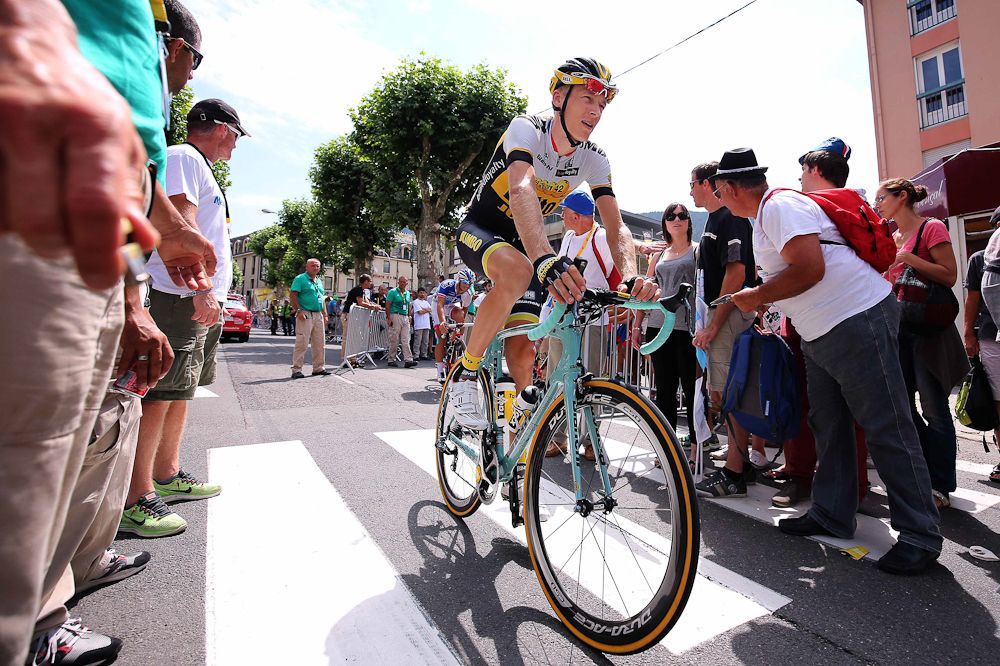 Robert gesink rides to the start of stage 15.