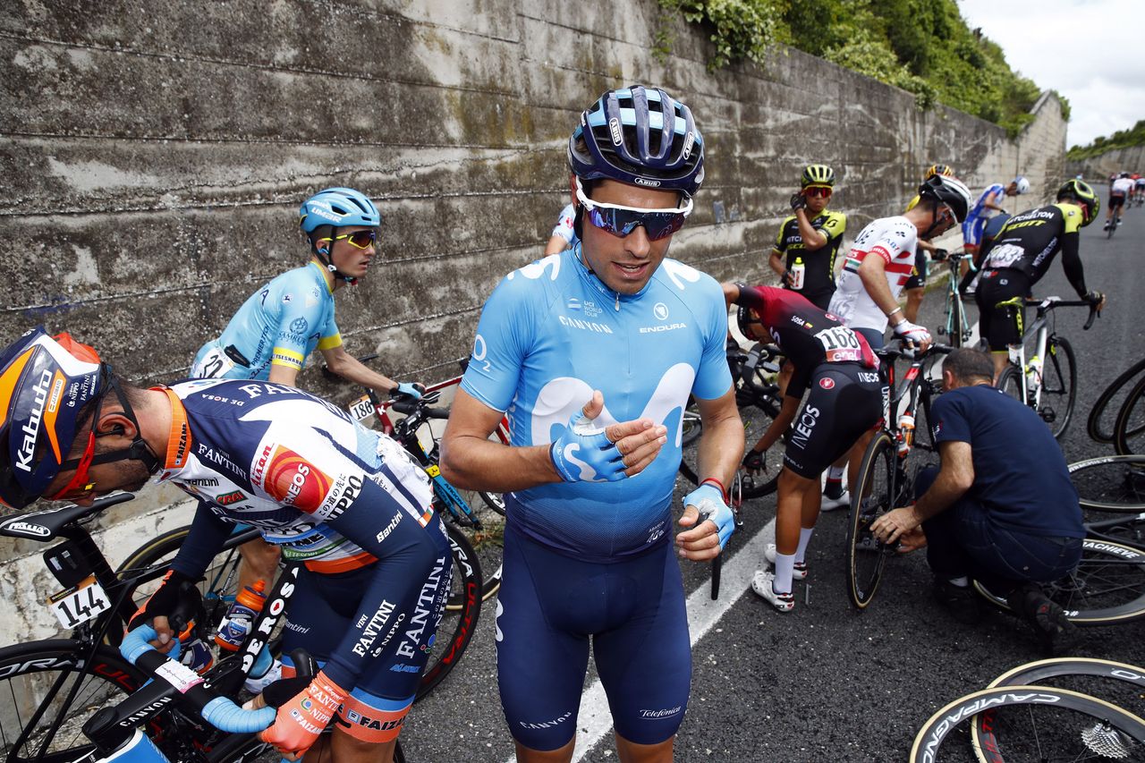 Mikel Landa (Movistar) checks his hand after the crash