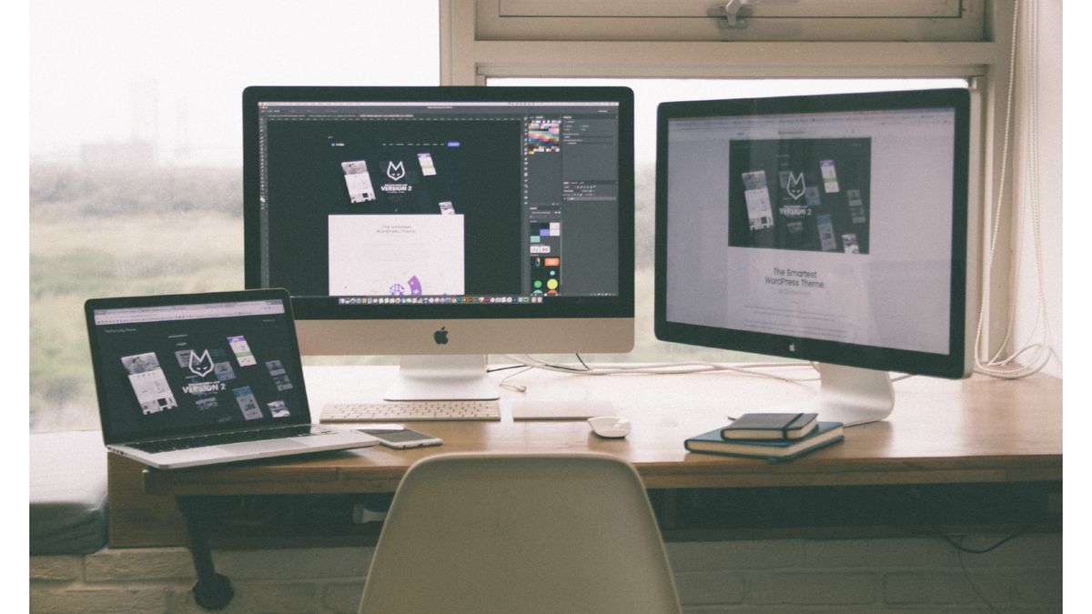 Macs and MacBook on a table