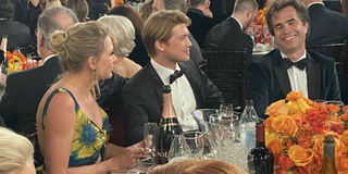 Taylor Swift sits with Joe Alwyn at the Golden Globes