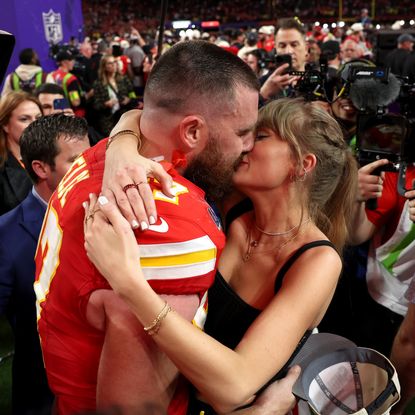 Travis Kelce #87 of the Kansas City Chiefs and Taylor Swift embrace after defeating the San Francisco 49ers in overtime during Super Bowl LVIII at Allegiant Stadium on February 11, 2024 in Las Vegas, Nevada. 