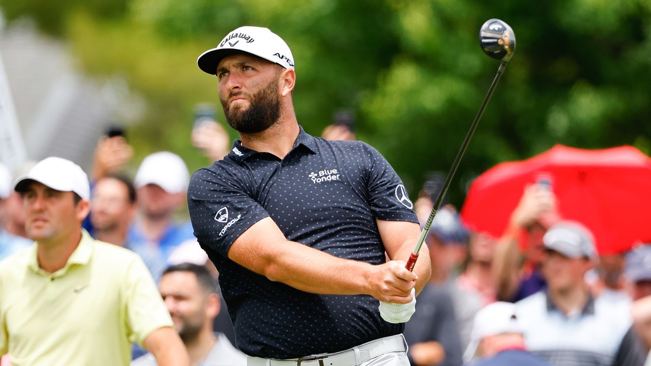 Jon Rahm hits a tee shot