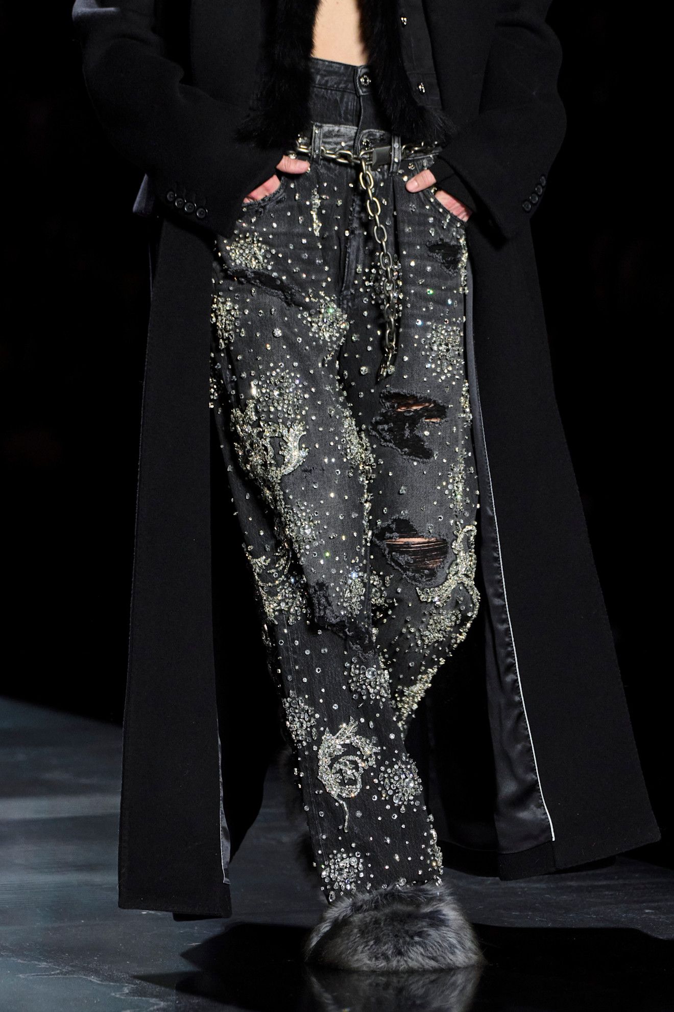 Model wears embellished jeans on the Dolce & Gabbana runway