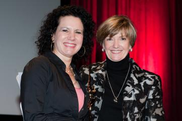 257367-Susie_Essman_l_of_HBO_s_Curb_Your_Enthusiasm_presents_the_Wonder_Woman_award_to_Diane_Tryneski_SVP_at_HBO__0.jpg