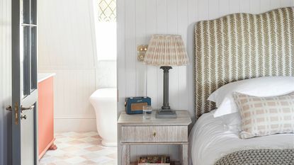 Grey bedroom with striped headboard