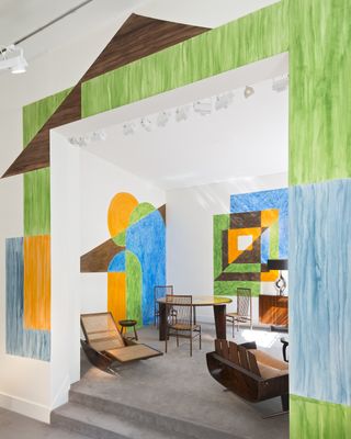 indoor seating area with colourful design on walls