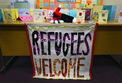 A sign welcoming refugees in Northern Ireland.