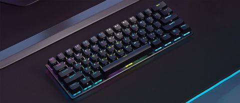 A Corsair K70 Pro Mini Wireless keyboard on a gaming mat