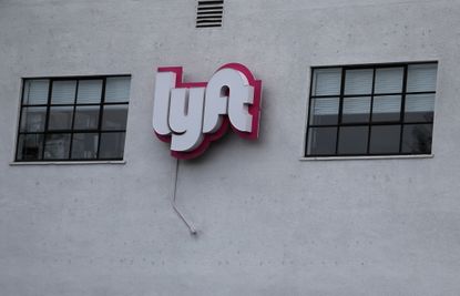 The Lyft logo is displayed on a Lyft Hub on March 7, 2019 in San Francisco, California.