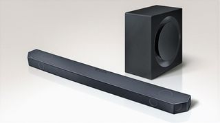 Samsung HW-Q900C soundbar and sub pacakage in black on a beige background