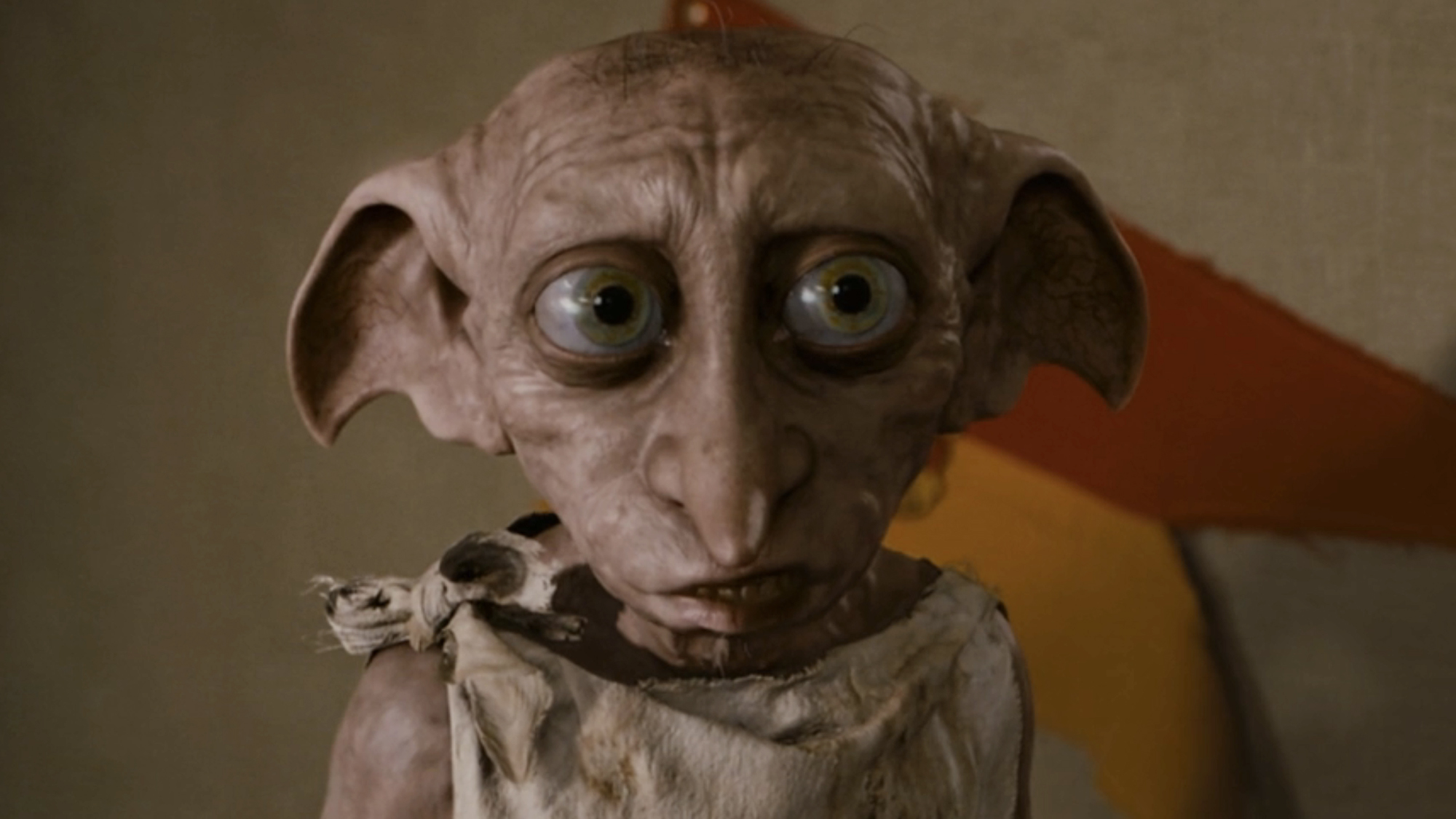 Dobby the house elf wearing nothing but a bag for clothes in his first appearance, Harry Potter and the Chamber of Secrets.