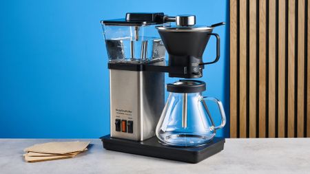the simply good coffee plastic-free brewer photographed against the blue tom's guide backgrounds