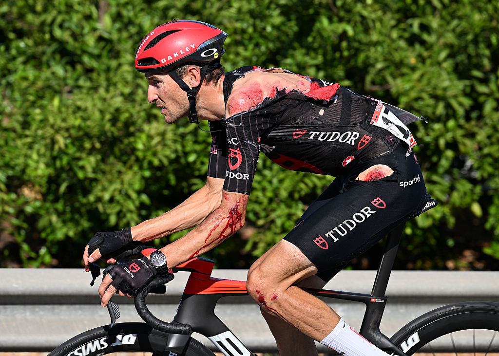 XERACO, SPAIN - AUGUST 29: (EDITOR&amp;rsquo;S NOTE: Image contains graphic content.) Roland Thalmann of Switzerland and Team Tudor Pro Cycling after being involved in a crash during the La Vuelta - 81st Tour of Spain 2026, Stage 8 a 171km stage from Pucol to Xeraco / #UCIWT / on August 29, 2026 in Pucol, Spain. (Photo by Tim de Waele/Getty Images)