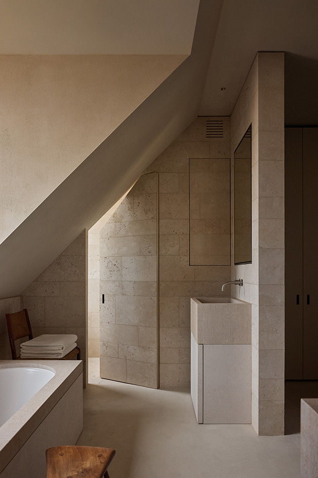 views of neutral colours and minimalist interior in belgian penthouse