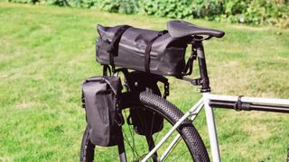 A tainfin bikepacking pannier bag setup