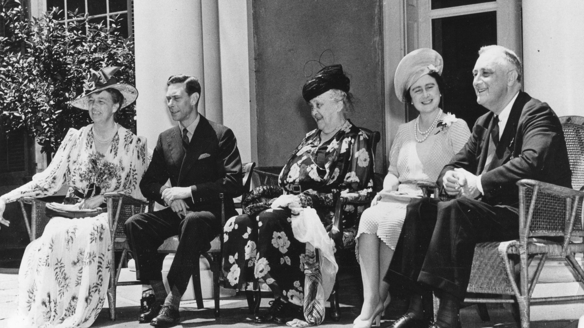 The Roosevelts (including President Franklin, First Lady Eleanor and his mother Sara) sit with Queen Elizabeth and George VI