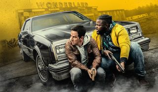 Spenser Confidential Mark Wahlberg and Winston Duke take cover in front of a car