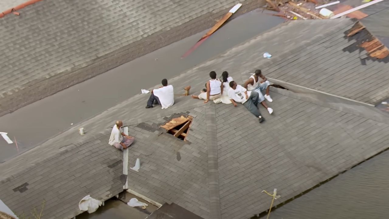 New Orleans residents on a roof during the flood in Katrina: Come Hell and High Water
