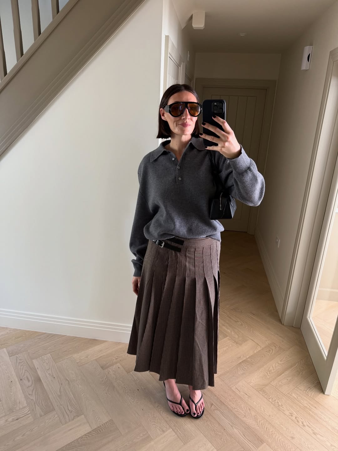 Sarah wearing kilt skirt
