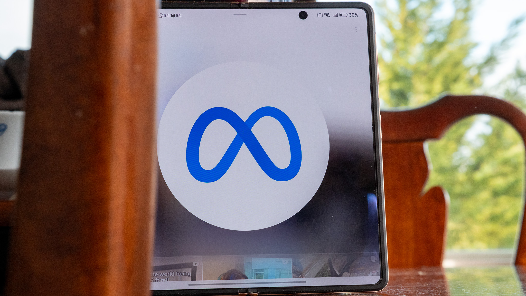 The Meta logo on an Honor Magic V5 foldable phone