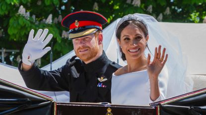 Meghan Markle and Prince Harry in the carriage after their wedding ceremony