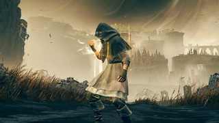 A character in Elden Ring: Shadow of the Erdtree stood in a field with elaborate ruins in the backdrop, clenching their fist as they charge up an attack.