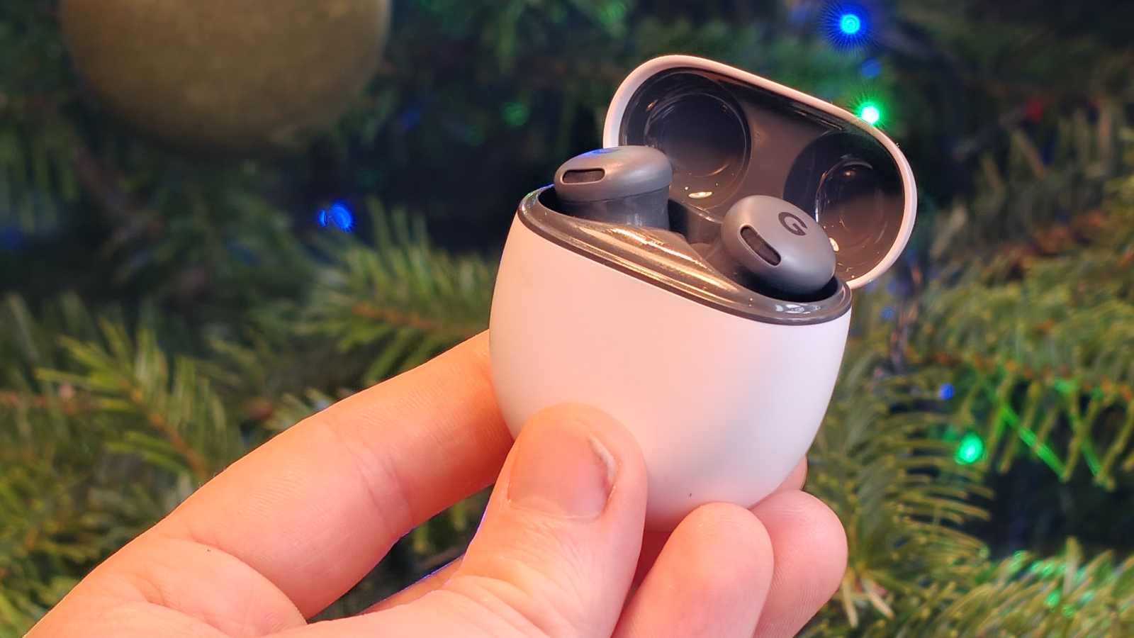 The Google Pixel Buds 2a buds in the case.