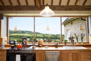 kitchen_beams_sink_countryside_view