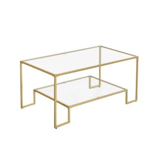 A two-tier rectangular coffee table with gold legs and borders