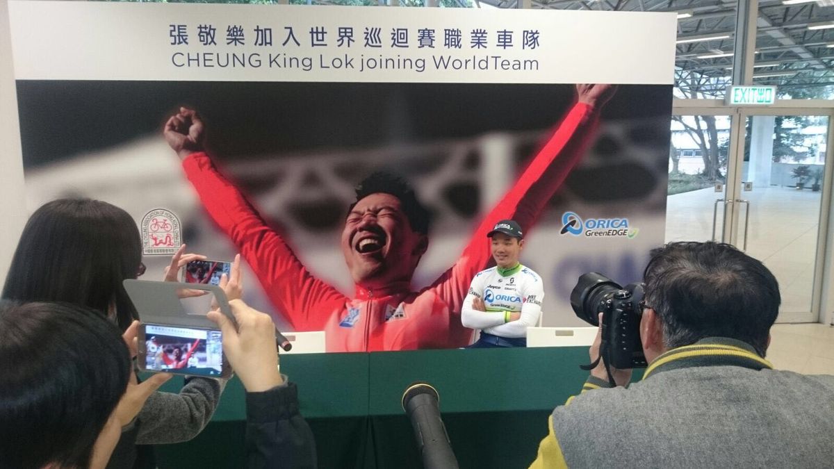 King Lok Cheung talks to the press at the ceremony in Hong Kong