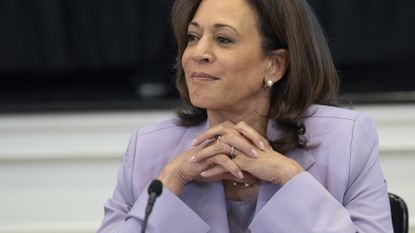 Kamala Harris with her hands folded