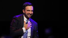 Zohran Mamdani puts his hand on his heart as he celebrates his mayoral race victory an election night event at the Brooklyn Paramount Theater in New York City