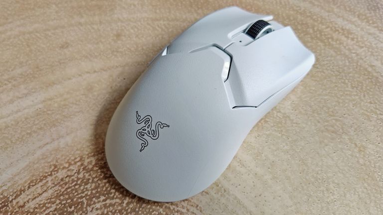 Razer Viper V2 Pro review: mouse on a desk with other peripherals