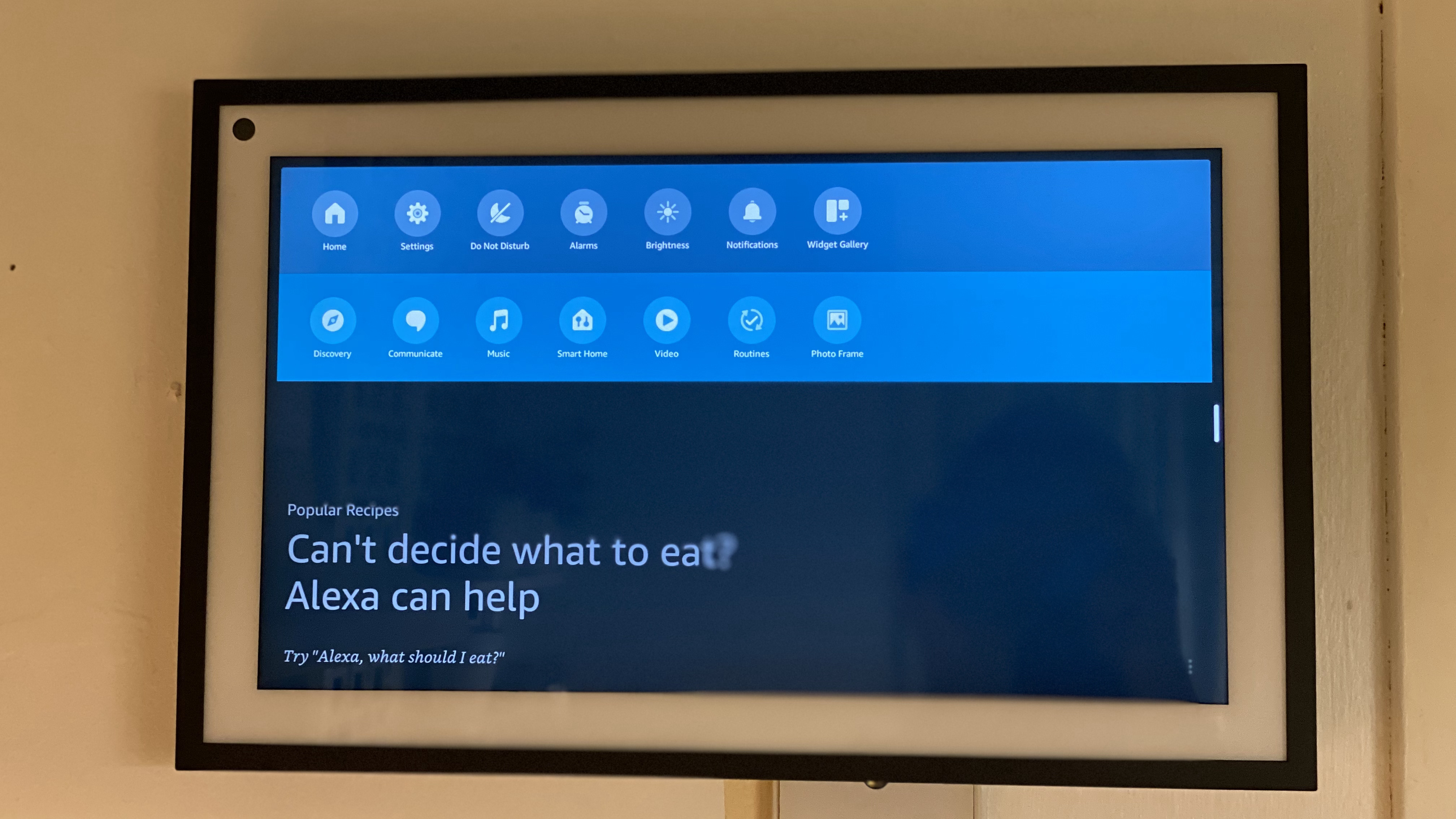 Amazon Echo Show 15 on a kitchen wall