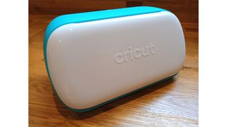 Cricut Joy review; a small craft machine in white and blue