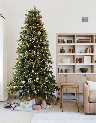 Christmas tree in a small living room, Christmas living room decor by Marie Flanigan