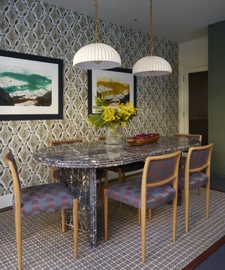 dining room with retro wallpaper and marble table