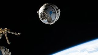 Boeing Starliner makes an uncrewed approach to the International Space Station during its second test flight, on May 20, 2022.