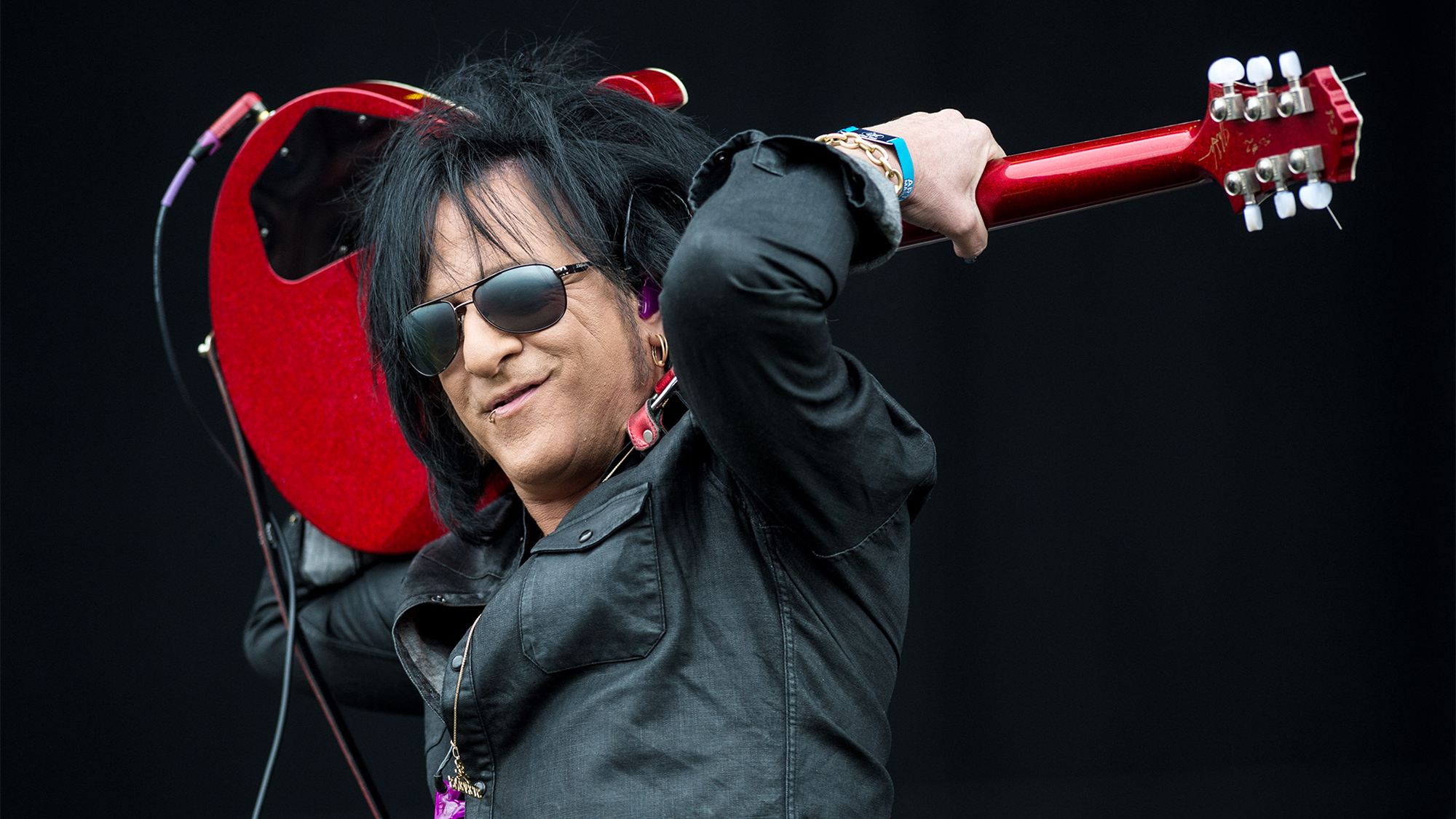 Steve Stevens performs with Billy Idol on the main stage at the Download Festival at Donnington Park on June 14, 2015 in Donnington, United Kingdom