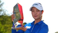 Miranda Wang poses with the FM Championship trophy following her win in 2025