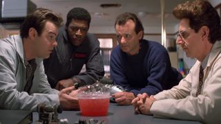 From left to right: Dan Aykroyd, Ernie Hudson, Bill Murray and Harold Ramis all looking at slime in Ghostbusters 2.