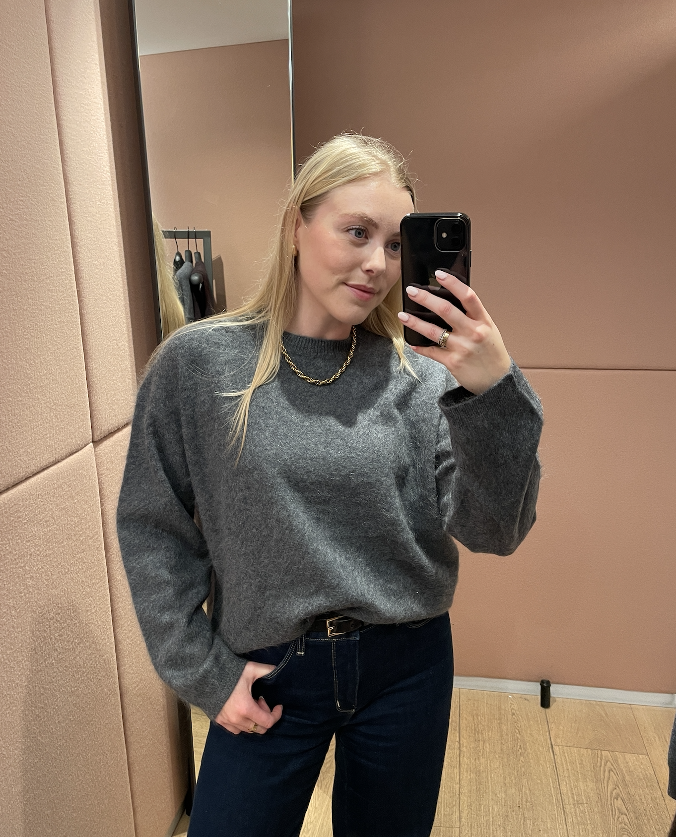 Florrie Alexander wearing grey COS knit.