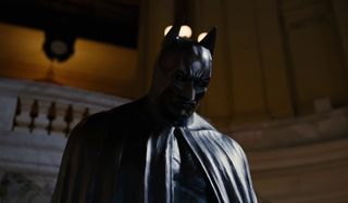The Dark Knight Rises Batman's memorial statue
