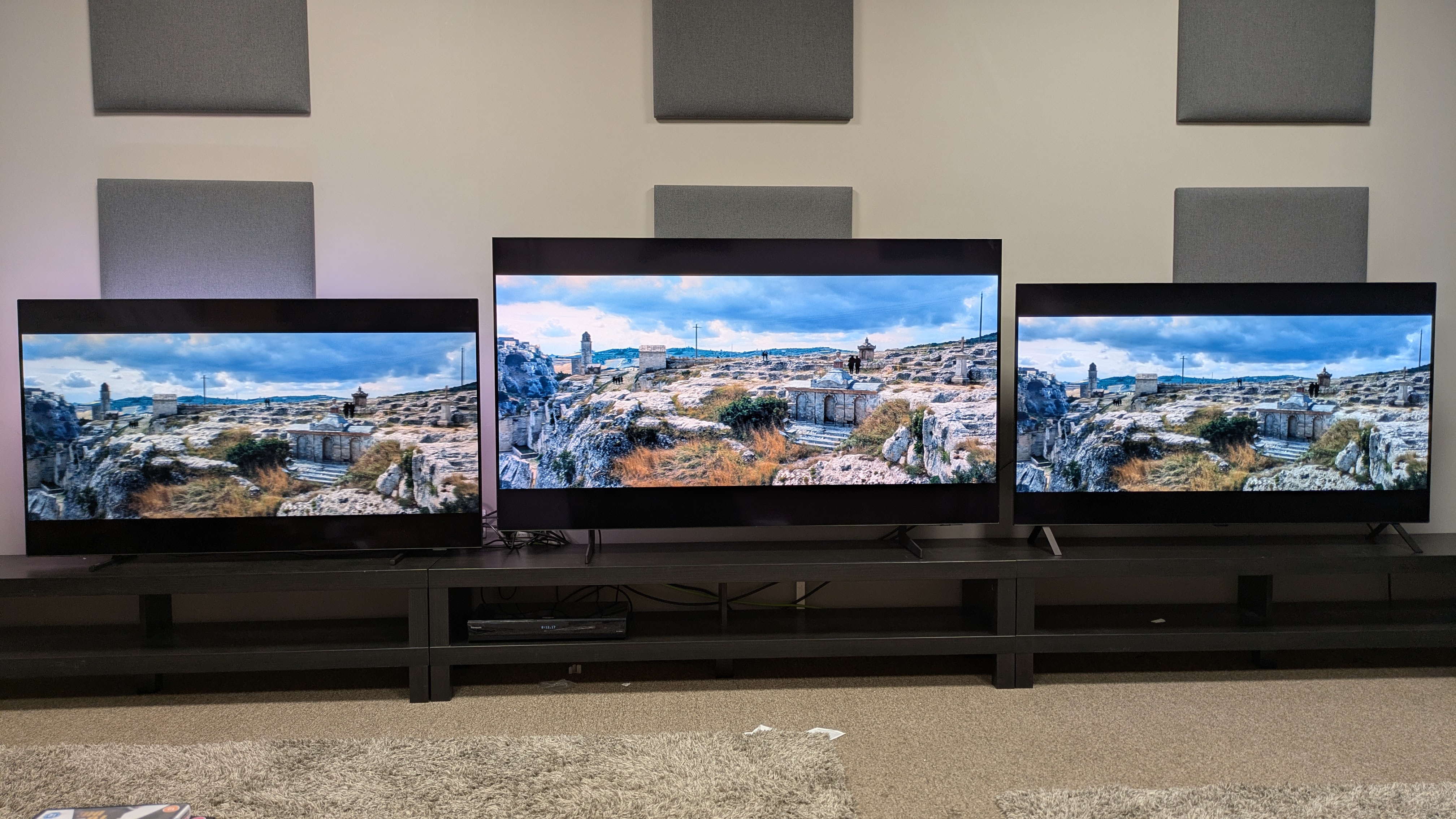 Philips OLED760 vs Samsung S85F vs LG B5 showing the graveyard scene from No Time To Die on screen