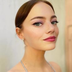 Emma Stone with glowy lilac makeup