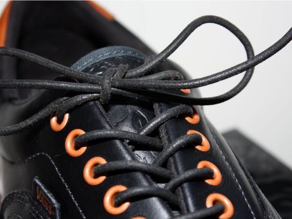The matching Vans shoes feature the same embossed pattern in the tongue plus leather uppers and laces.