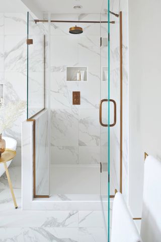 A white contemporary bathroom with a shower
