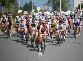 The women's peloton contests the 96km road race.