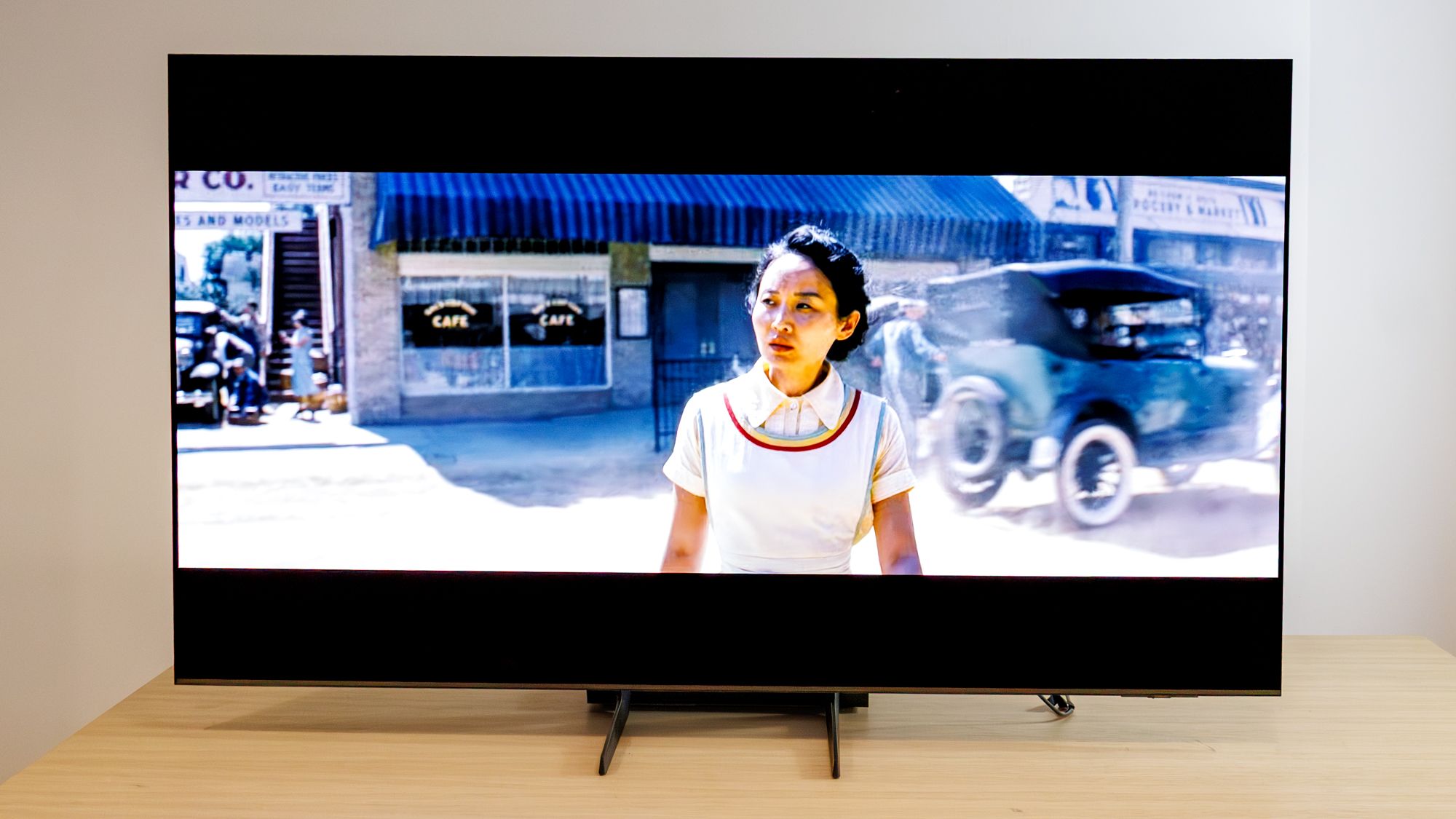 Samsung OLED S85F TV on a table
