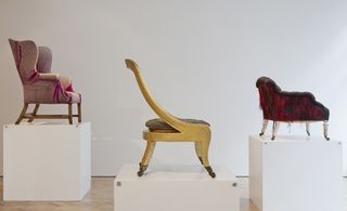 8 period chairs in a exhibition